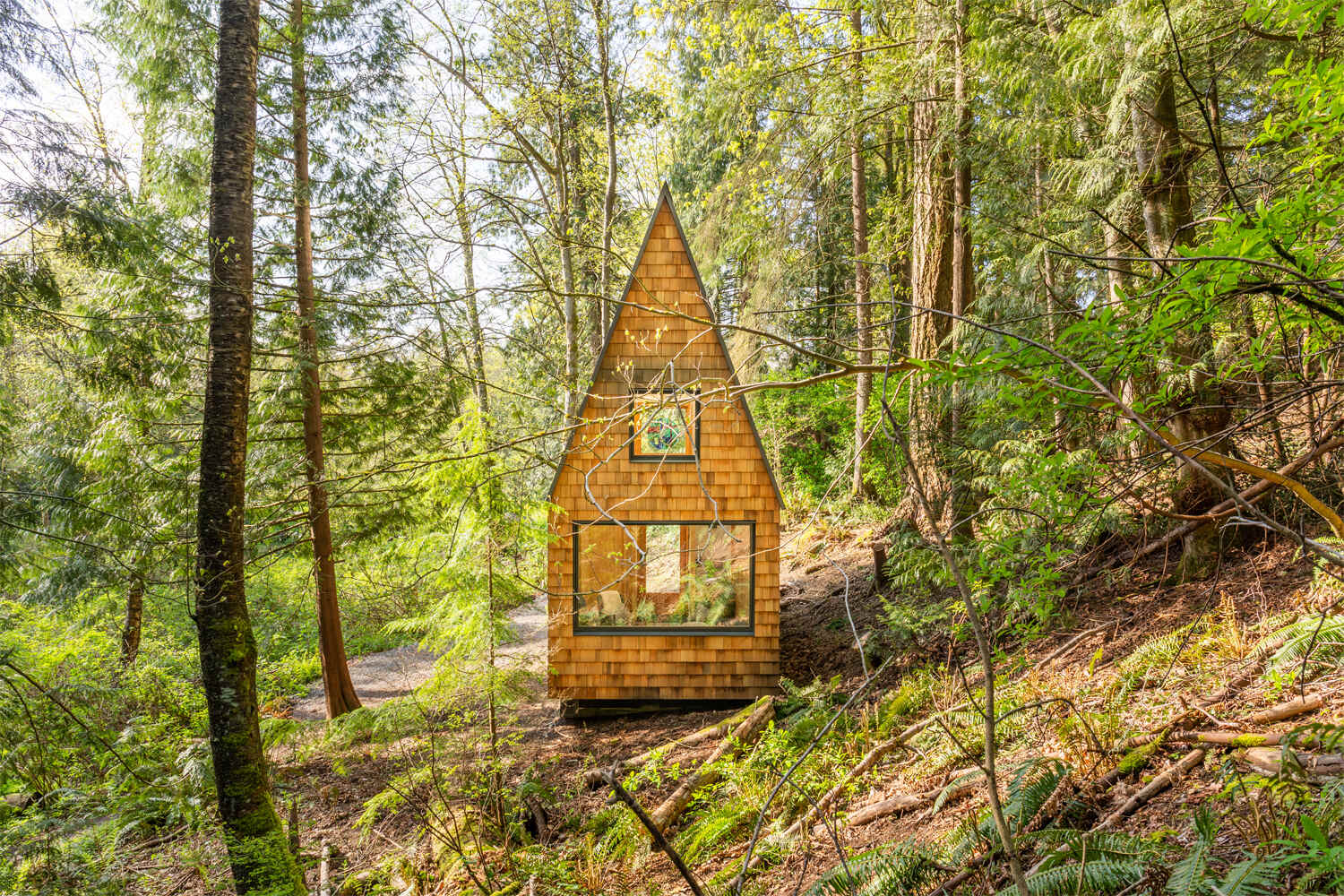 A small shingle-clad chapel.