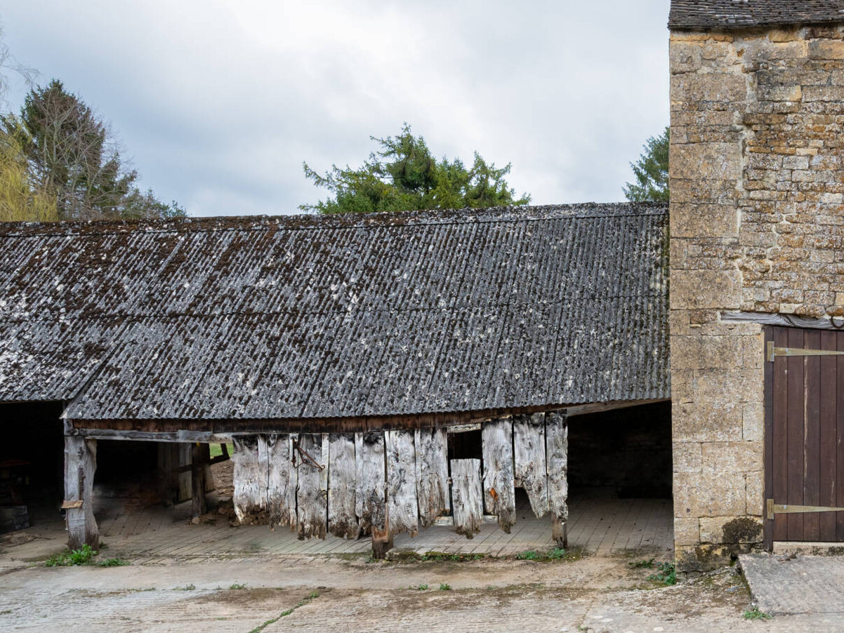 This cowshed was transformed into a two bedroom home that kept some of the original features.