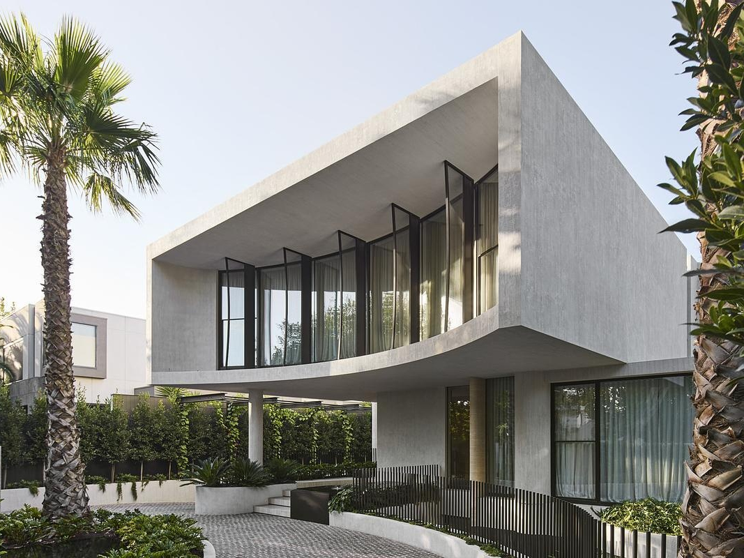  A light-filled four-storey Melbourne home by mckimm, inspired by LA hillside living with organic textures and seamless indoor-outdoor flow.