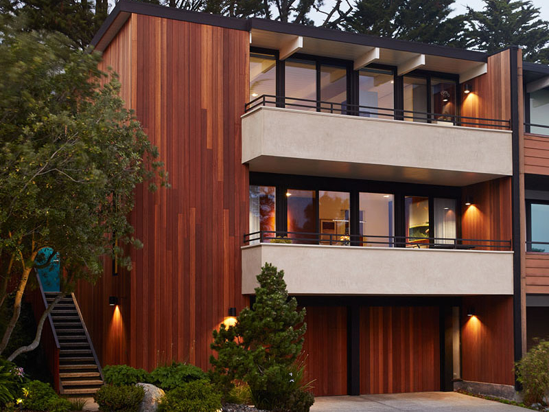 A modern home with bright, airy spaces that blend mid-century style and contemporary elegance, designed for seamless indoor-outdoor living.