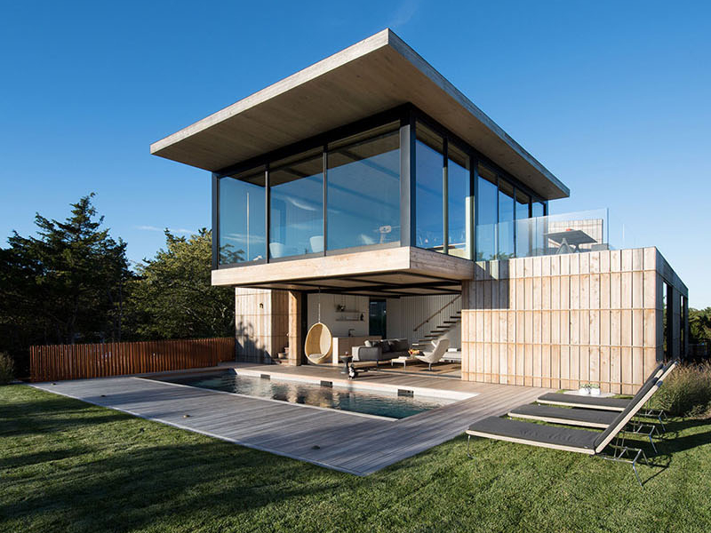 A contemporary beach home wrapped in cedar, bronze, and weathering steel, designed to age beautifully in the coastal climate.