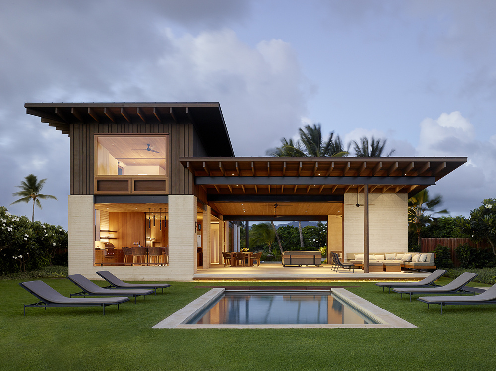 A serene Kauai home that opens like a butterfly, balancing privacy and oceanfront living in effortless harmony.