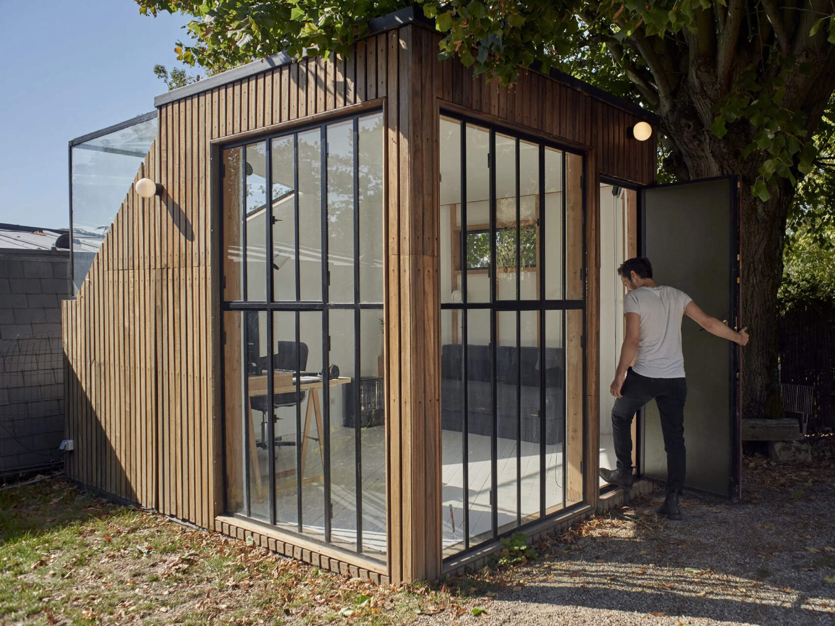 A compact backyard studio designed by JCPCDR Architecture for a composer seeking a quiet workspace in the countryside.