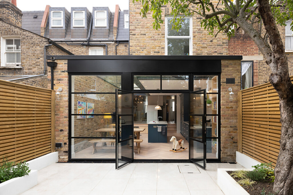 This bright rear extension opens the home to the garden, combining open-plan living with generous natural light and a seamless indoor outdoor connection.
