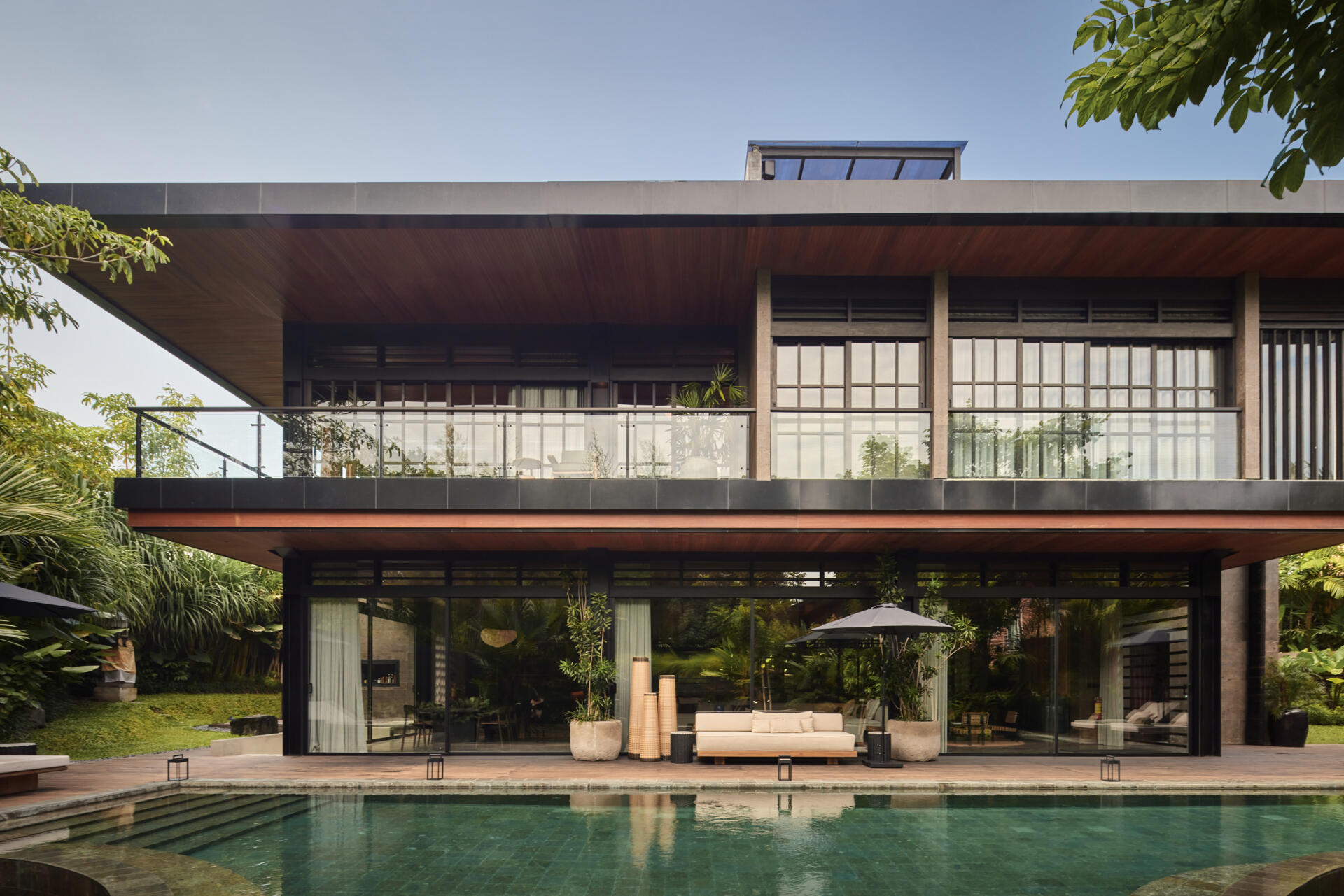 Villa Suki by Alexis Dornier in Bali transforms a simple square into a beautiful tropical home filled with gardens, light and modern interiors.