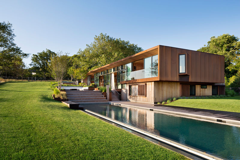 Explore the mix of concrete, cedar, reclaimed wood and Corten steel that gives this Hamptons home its timeless character.
