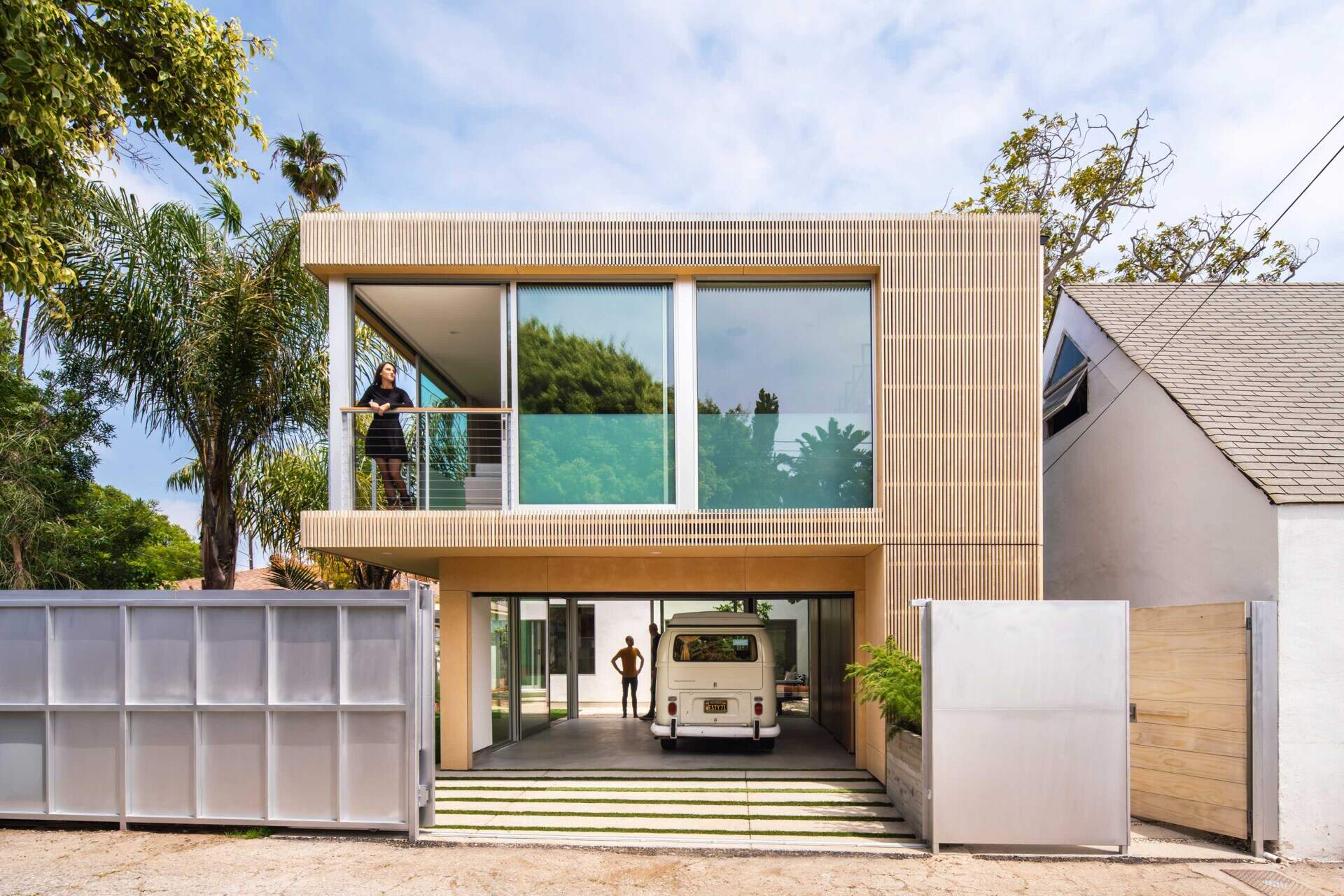See how a rebuilt garage helped create a beautiful courtyard, more garden space, and a modern backyard layout for this California family home.
